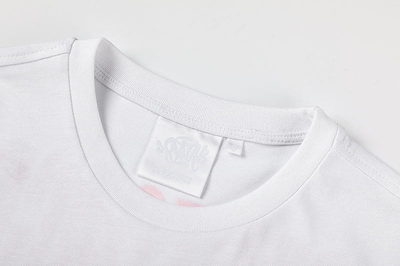 Unisex white graphic T-shirt with red graffiti-style print and black illustrated front graphic - view 10
