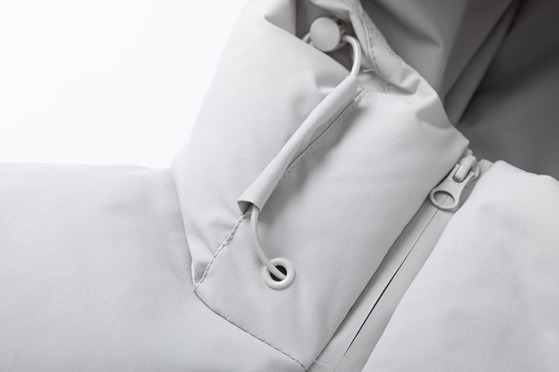 Light gray Trapstar hooded puffer jacket with front logo, full zip, quilted panels, and zippered pockets - view 12