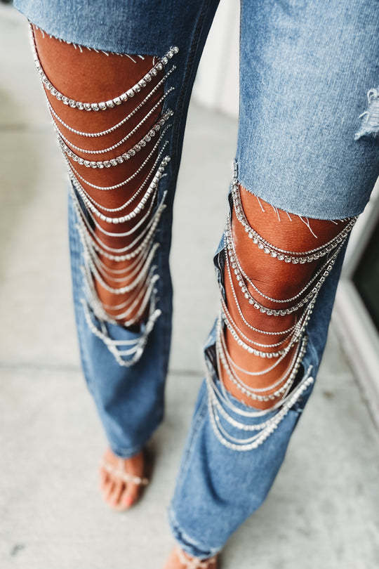 Early spring jeans with big holes for women, straight pants with chain ornaments