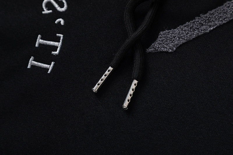 Black Trapstar graphic pullover hoodie and jogger pants two-piece tracksuit set with blue, white and gray lettering - view 15