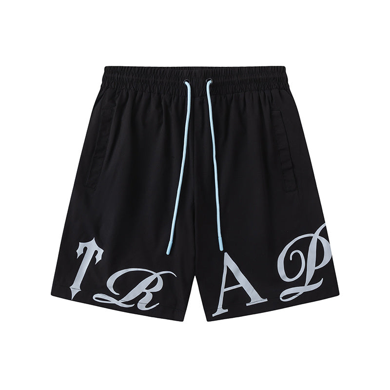 Black unisex drawstring shorts with blue letter graphic, elastic waistband, and side pockets - view 15