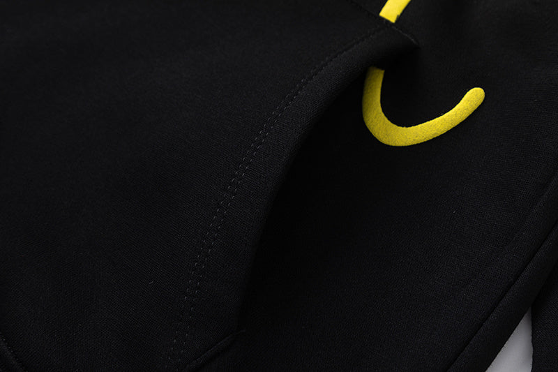 Black hoodie and joggers tracksuit set with bold yellow graffiti-style graphic print - view 17