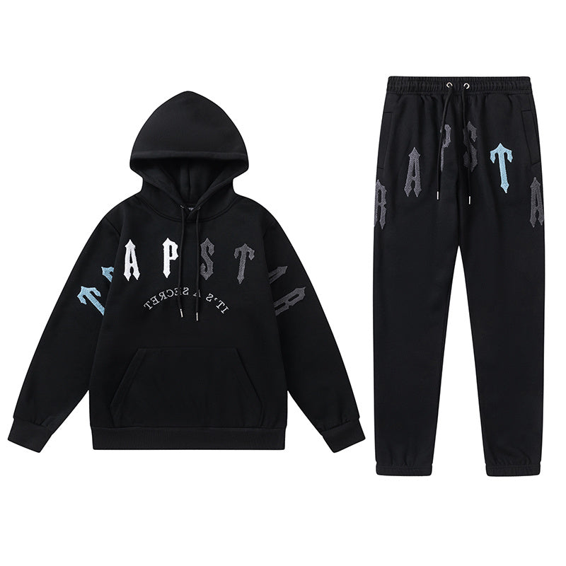 Black Trapstar graphic pullover hoodie and jogger pants two-piece tracksuit set with blue, white and gray lettering - view 24