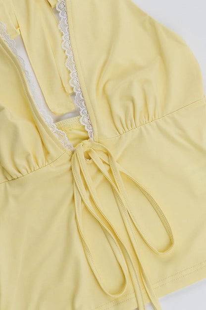 Einfarbiges Neckholder-Top mit tiefer V-Aussparung und Spitzendetails