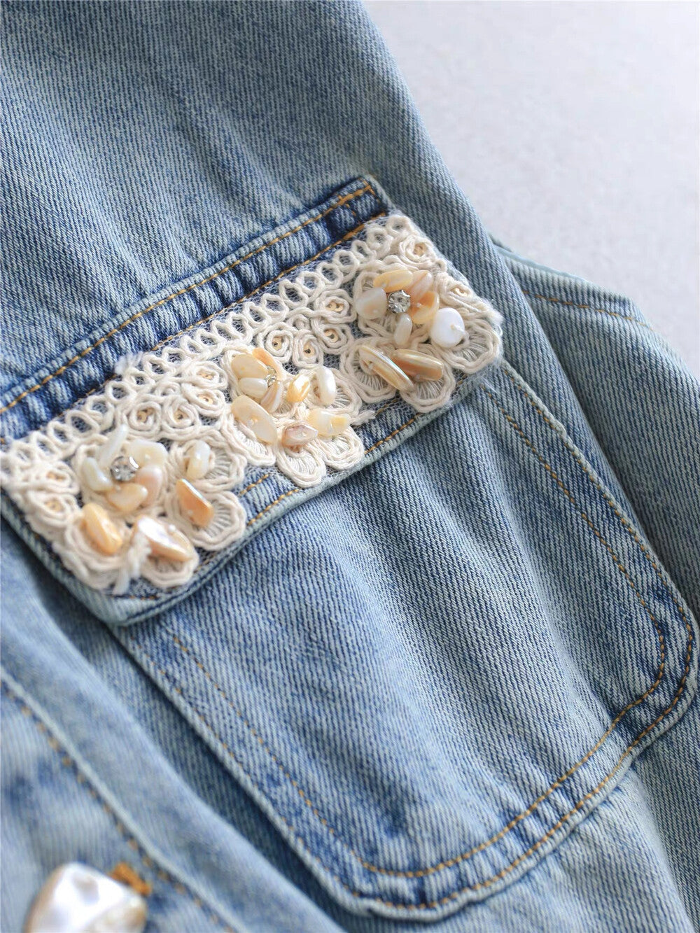 Women's Light Blue Washed Denim Sleeveless Lapel Collar Pearl Button Maxi Dress Lace Floral Chest Pockets Elastic Waist with Free Woven Tassel Waist Accessory S M L XL - Seldom Seen Styles