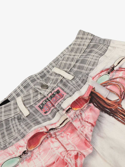 Bedruckte Patchwork-Jeans mit Taillengrafik und Drapierung in Fassform