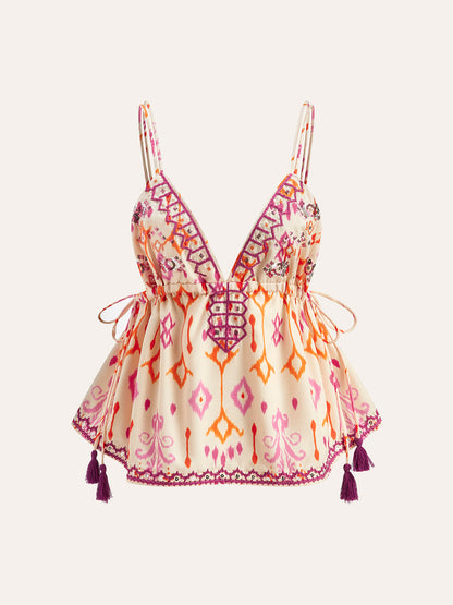 Haut caraco bohème à broderies et liens à pompons