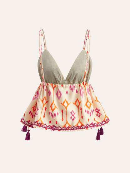 Haut caraco bohème à broderies et liens à pompons