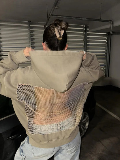 Haut à capuche sans dos en maille transparente