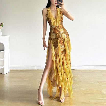 Robe longue en voile imprimé à nouer dans le cou, col en V et volants