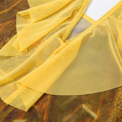 Robe longue en voile imprimé à nouer dans le cou, col en V et volants