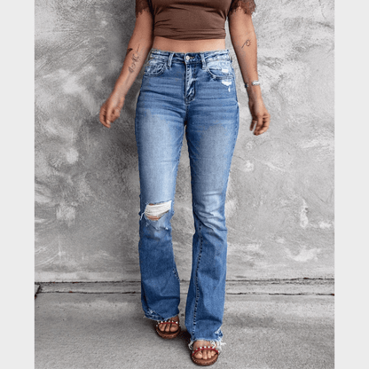 Zerrissene Jeans mit ausgestelltem Bein und hoher Taille