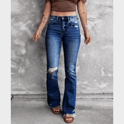 Zerrissene Jeans mit ausgestelltem Bein und hoher Taille