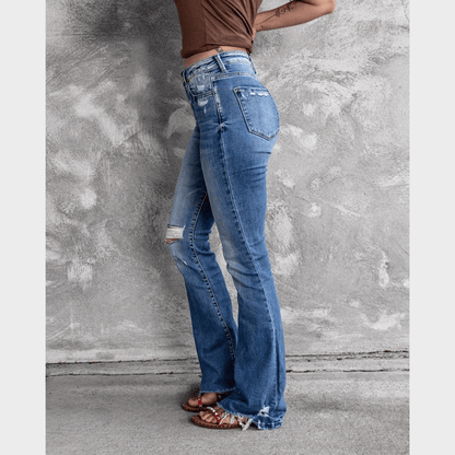 Zerrissene Jeans mit ausgestelltem Bein und hoher Taille