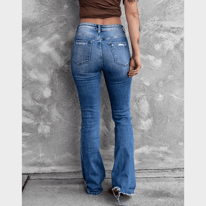 Zerrissene Jeans mit ausgestelltem Bein und hoher Taille