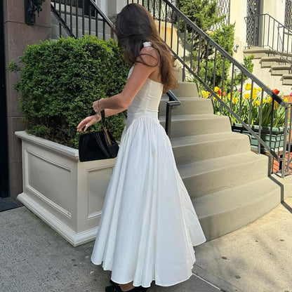 Nouvelle robe femme couleur unie sexy décolleté plongeant creux licou tempérament grande jupe évasée