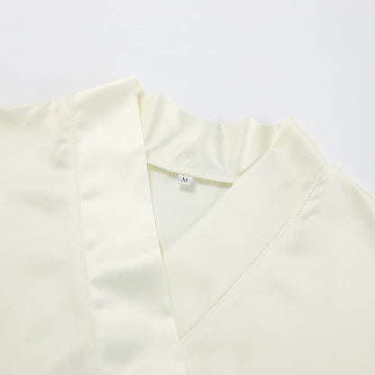 Robe ample ceinturée à col en V