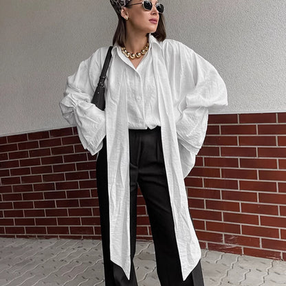 2025 autumn and winter new design sense commuter loose streamer shirt French design sense white horn sleeve top women
