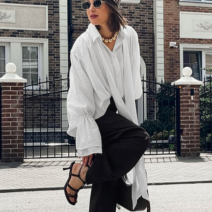 2025 autumn and winter new design sense commuter loose streamer shirt French design sense white horn sleeve top women