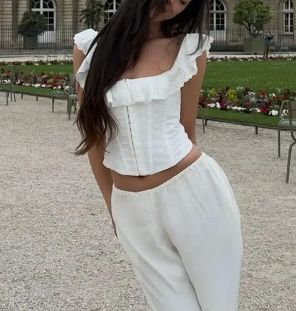 LEILA HAUT À VOLANTS AVEC CORSET À ŒILLETS