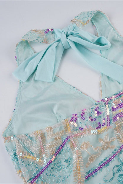 Haut dos nu à sequins avec col en V et liens à nouer dans le dos