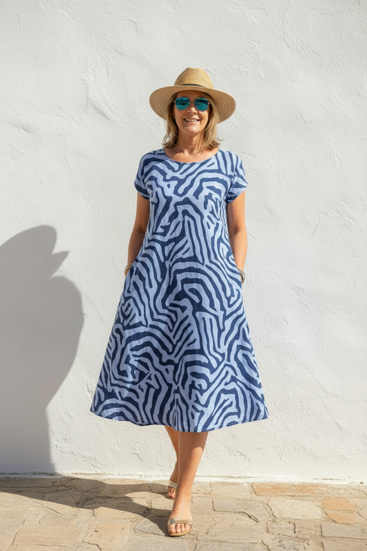 Vestido Alba - Silueta PerfectaWomen's A Line Midi Dress Short Sleeve Casual Loose Fit Printed Dress with Pockets - Seldom Seen Styles