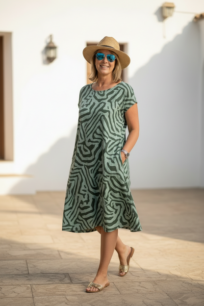 Vestido Alba - Silueta PerfectaWomen's A Line Midi Dress Short Sleeve Casual Loose Fit Printed Dress with Pockets