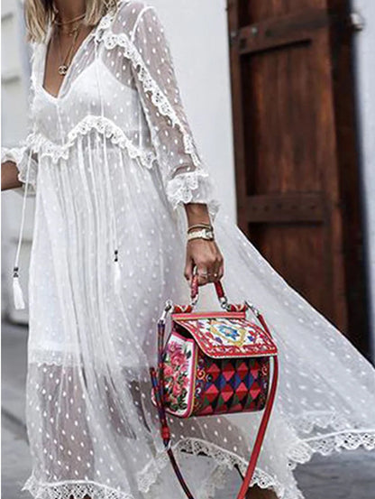 Robe longue maxi blanche à manches longues et pois en jacquard transparent