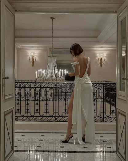 Robe longue en satin dos nu et fendue