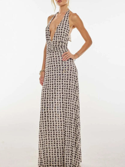 Robe longue dos nu fleurie à décolleté plongeant