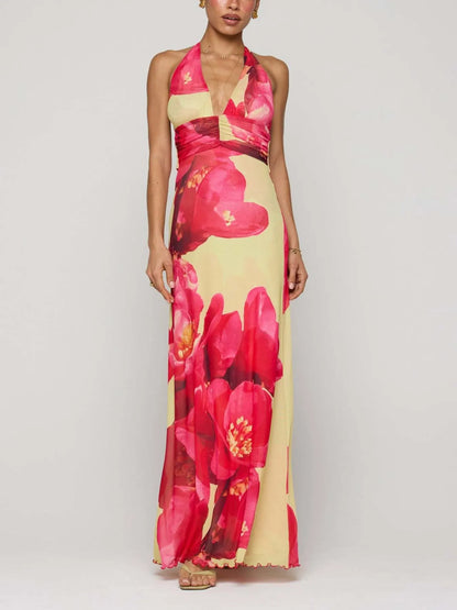 Robe longue dos nu fleurie à décolleté plongeant
