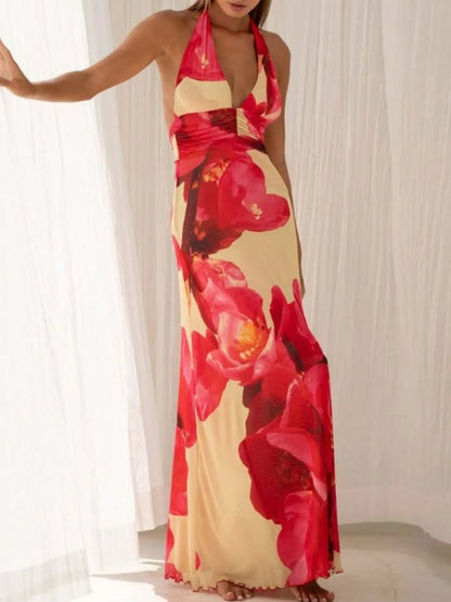 Robe longue dos nu fleurie à décolleté plongeant