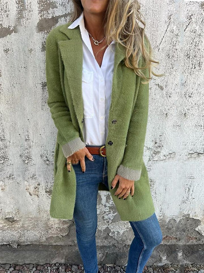 Manteau long à revers en fausse fourrure pour femme