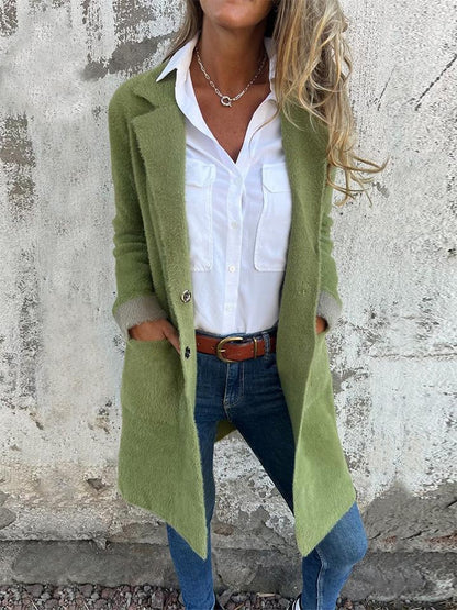 Manteau long à revers en fausse fourrure pour femme