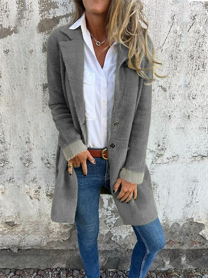 Manteau long à revers en fausse fourrure pour femme