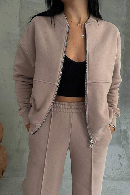 Ensemble deux pièces veste zippée et pantalon pour femme
