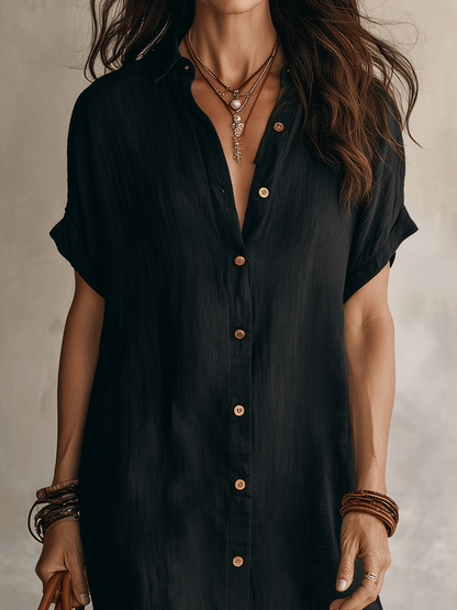 Modernes Boho-Kleid aus schwarzem Leinen, entspannt geschnitten und knielang