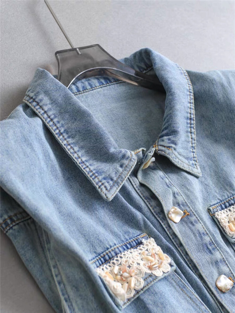Women's Light Blue Washed Denim Sleeveless Lapel Collar Pearl Button Maxi Dress Lace Floral Chest Pockets Elastic Waist with Free Woven Tassel Waist Accessory S M L XL - Seldom Seen Styles
