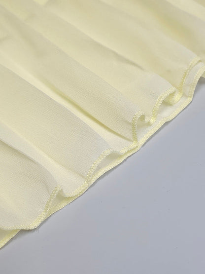 Robes de soirée longues plissées unies à col bateau, sans manches, en gaze, avec empiècements.