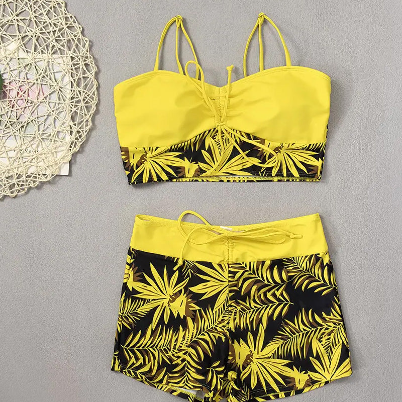 Two women's swimsuits with prints