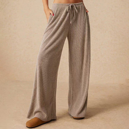 Female leisure trousers with wide legs and drawstring